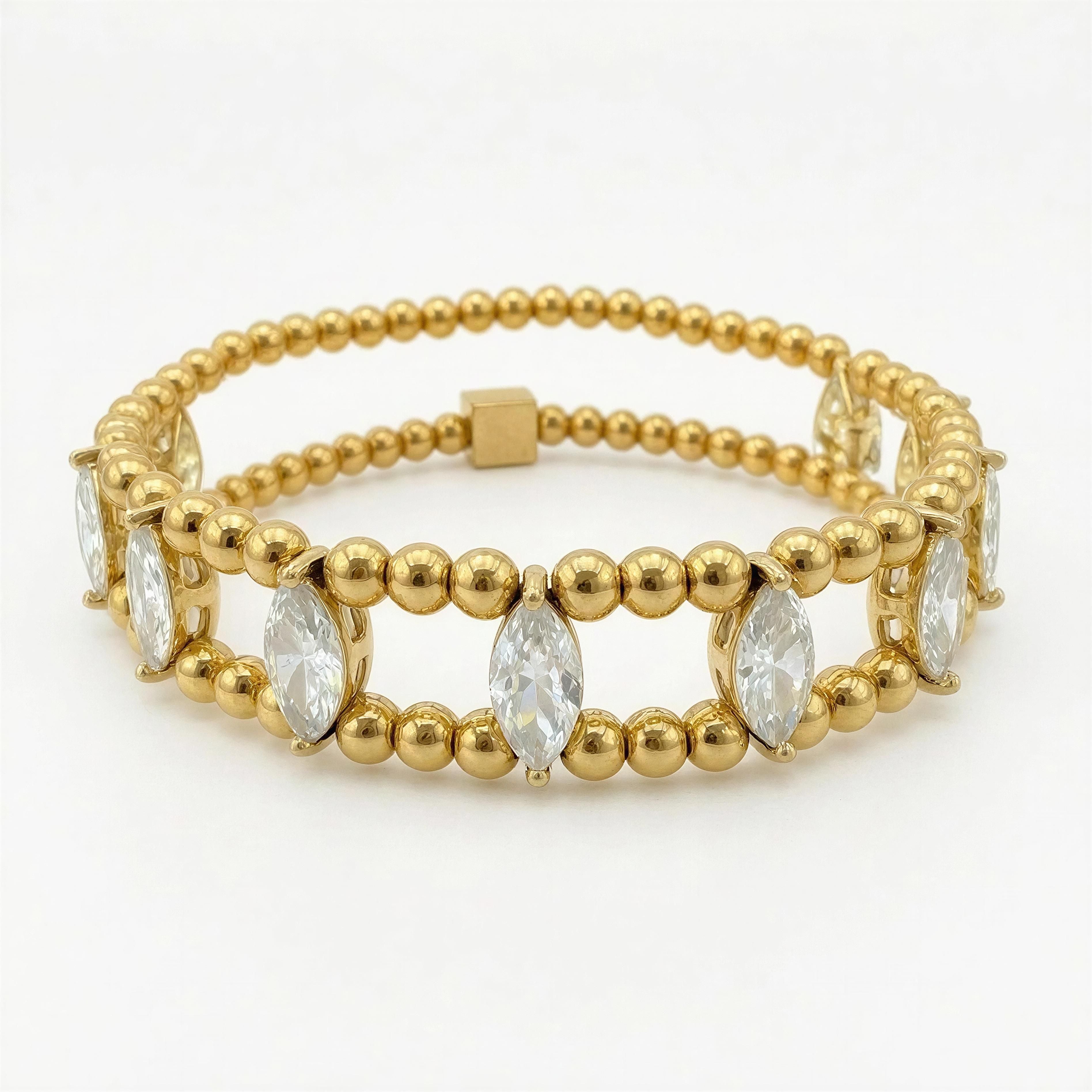 XX ÉLÉGANCE – LUMIÈRE D’OR gold beaded bracelet featuring clear marquise-cut stones, showcasing handcrafted luxury jewelry with elegant and refined design.