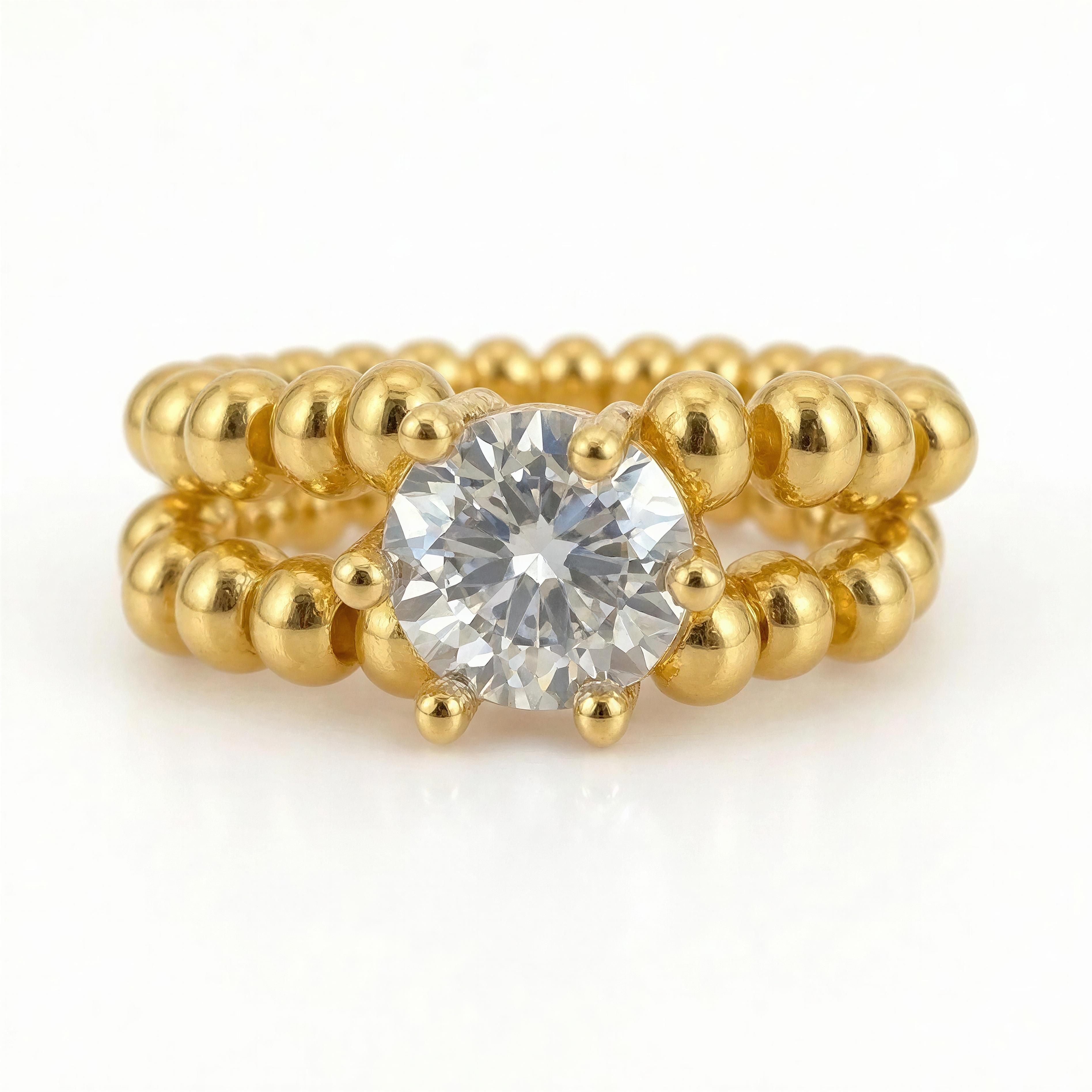 RING - LUMIÈRE ÉTERNELLE featuring a radiant round-cut clear gemstone set between two rows of polished gold beads, showcasing handcrafted luxury jewelry by atelier x.