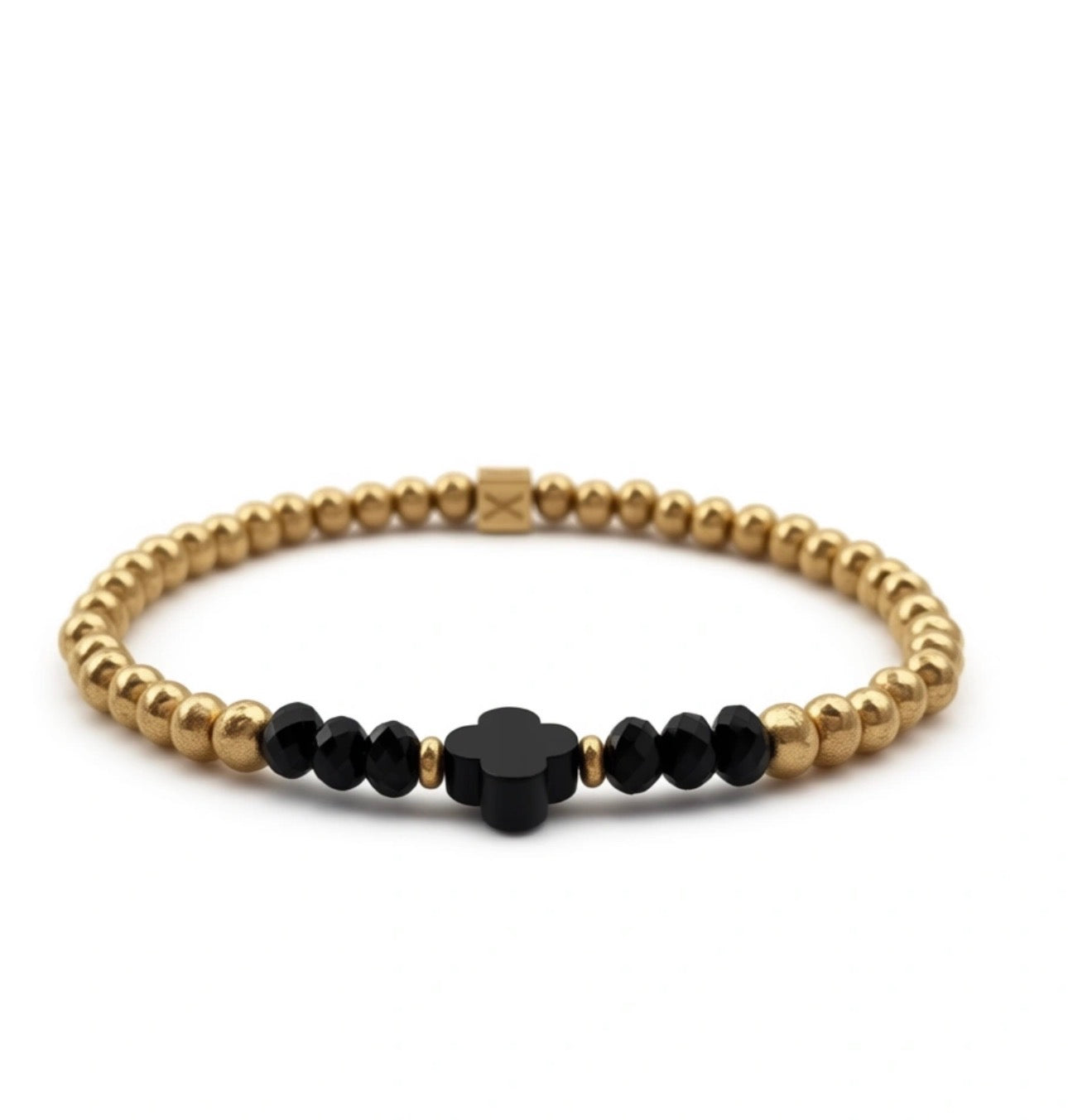 The Solea Collection – Aurea Solea Obsidia bracelet features polished gold beads paired with faceted black beads and a central black clover bead, embodying handcrafted luxury by Atelier X.