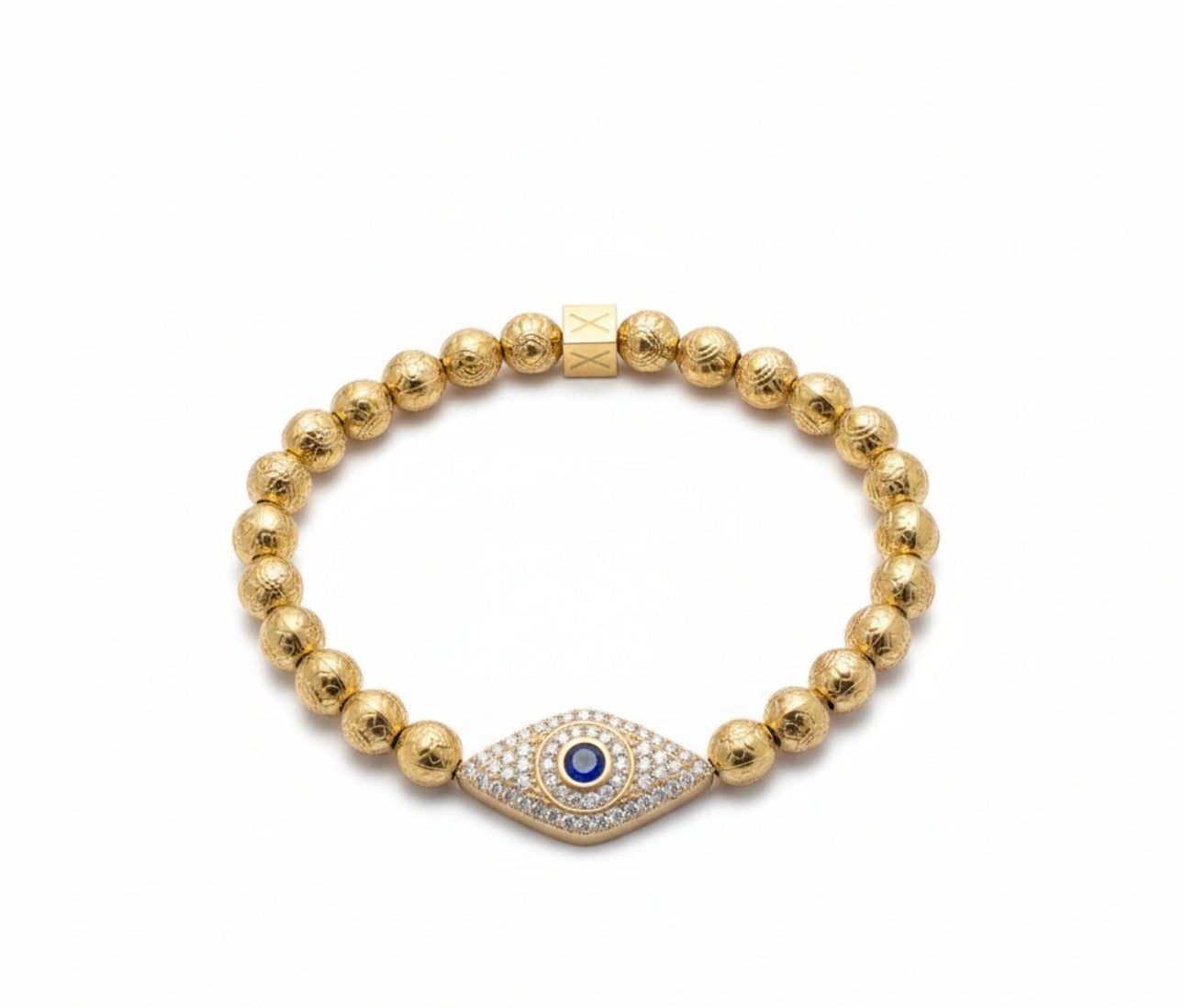 Limited Edition - Oculus Aurea Lux bracelet featuring gold beads and a central eye-shaped charm embellished with crystals and a blue gem, handcrafted luxury jewelry.